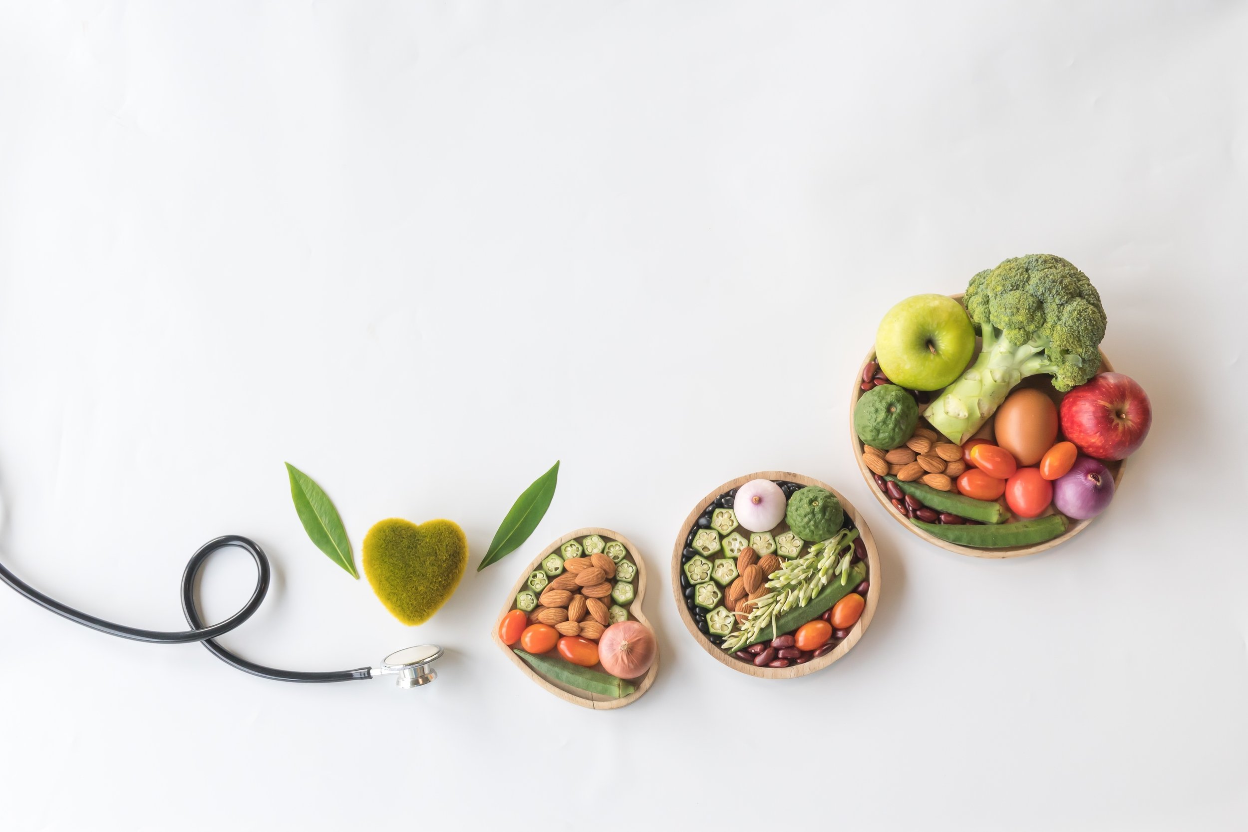 Healthy foods arranged with a stethoscope